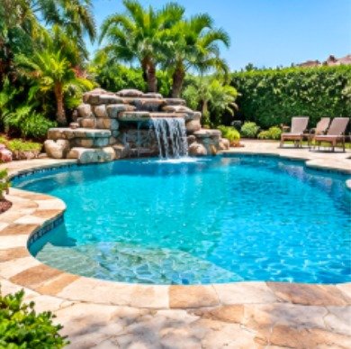 Before: freeform pool with a rock waterfall without a fence